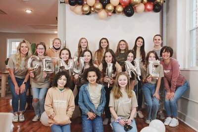 big group of girls smiling