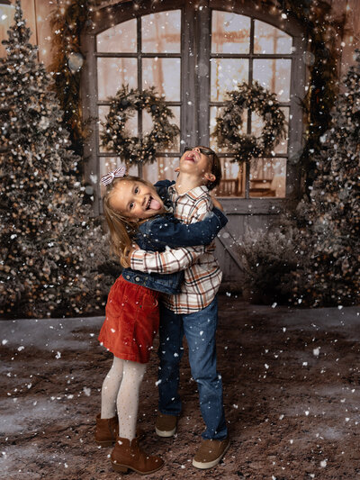 boy posing for christmas portraits