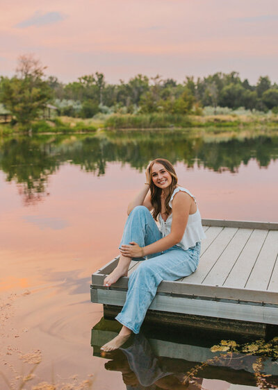 Washington State senior girl portrait with golden hour lighting near water