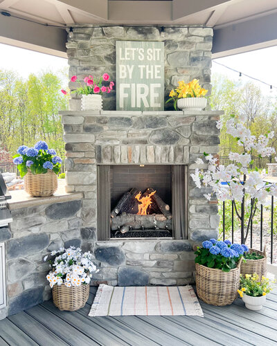 fireplace decorated with seasonal decor