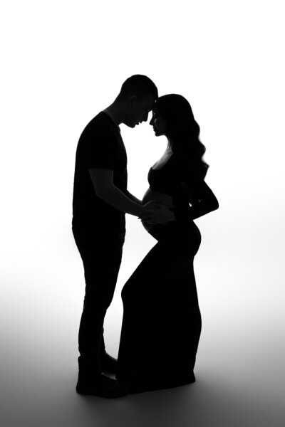 Couple maternity silhouette photography Austin TX studio session intimate portraits Cedar Park Texas