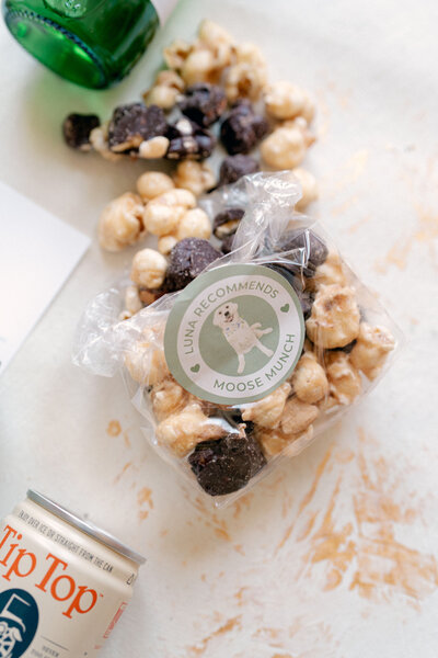 Watercolor pet portrait sticker on a pack of salty snacks for an adorable wedding welcome gift!