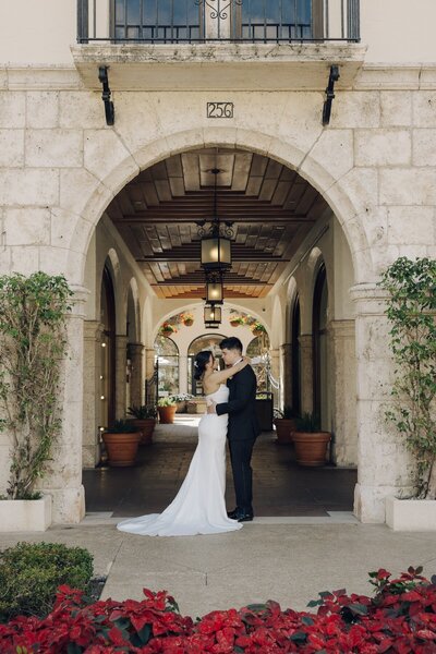 newly weds hold each other after wedding ceremony