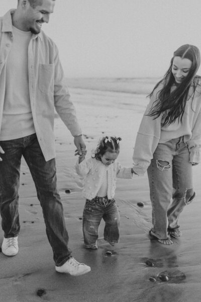Beach candid natural fun family photo shoot with kids, christmas holiday card photo shoot, San Diego portraits photographer, young families