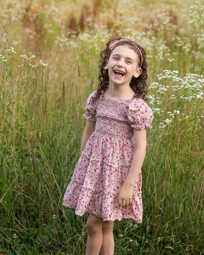 Happy Smiling girl in flowering field peninsula ohio