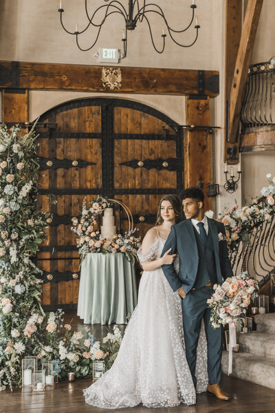 Wedding Photographer & Elopement Photographer,  bride and groom standing next to wooden door