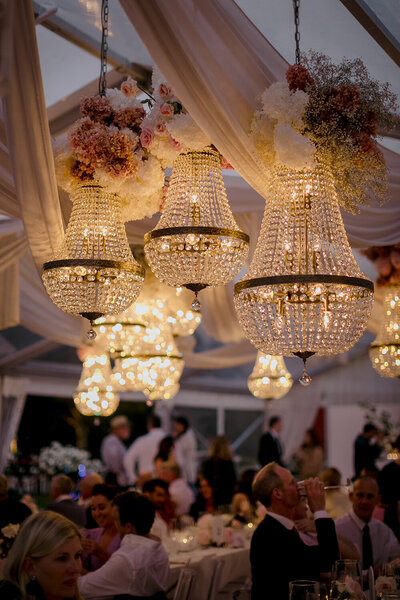 Beautiful lights in reception hanging chandeliers and candle light