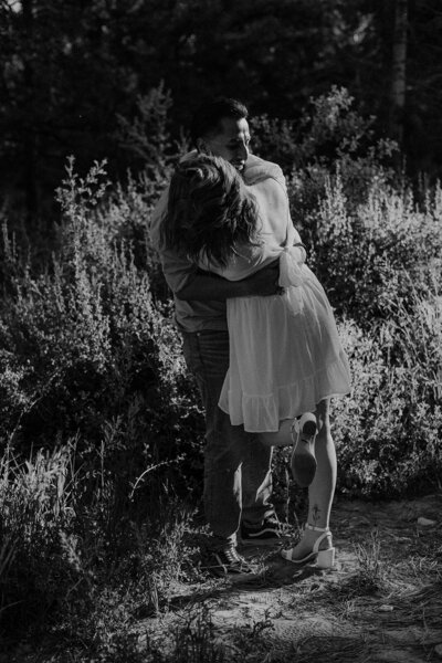 Two people hug