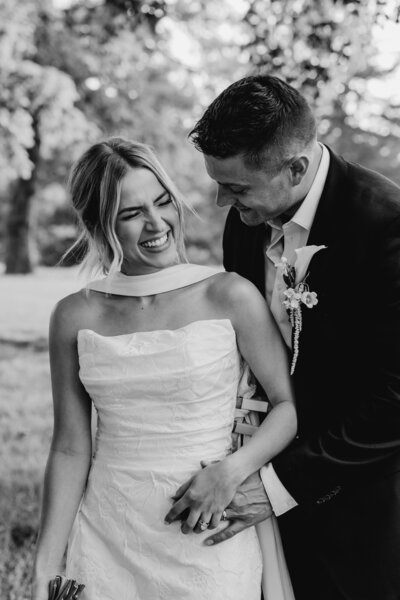 "Bride and groom celebrate their elegant luxury wedding at the historic Cottonwood Hotel in Omaha, NE – timeless moments captured by Tori Nichole Photography. A perfect blend of sophistication, romance, and architectural charm, showcasing the couple's love story in an unforgettable setting.