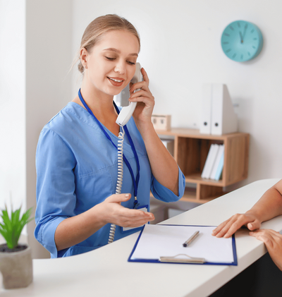 medical dental clinic employee contacting Fresh Nest Green Cleaning for reliable office cleaning and sanitizing