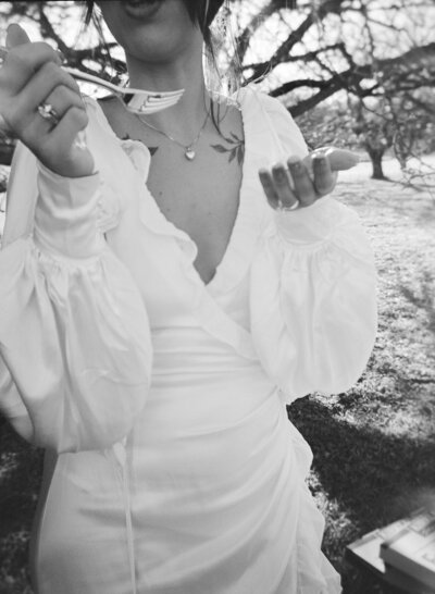 Bride eating cake captured on 120 medium format film on the holga by Cincinnati Wedding Photographer Cheyenne Bayne