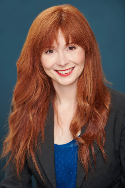 Professional Headshot Photographer in Edina Captures Confident Redhead Portrait-40