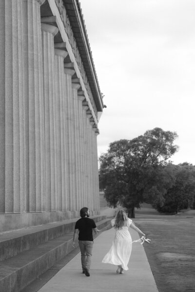 Black and white image of couple at Nashville Parthenon engagement session