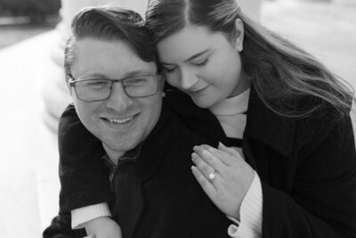 Virginia Film Wedding Photographers Caitlin and Devon Wilcox share an intimate embrace sitting on the steps of the Jefferson Memorial in DC | Caitlin Wilcox Photography