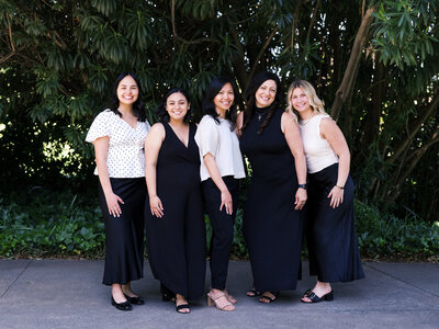 headshot of woman smiling at camera