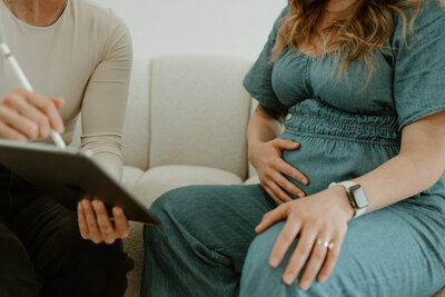 pregnant woman looking at chiropractic options