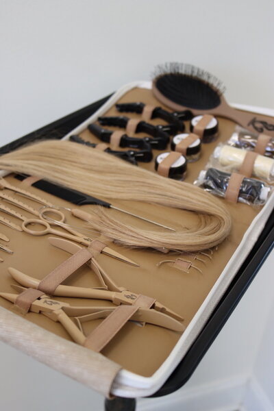 aesthetic beige leather hair extension tool kit with pliers bead looper clips needles and thread