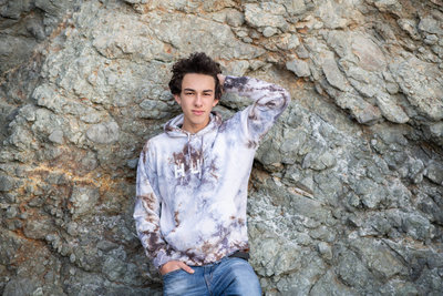 Edgy senior session with a high school senior guy at the beach in Northern California