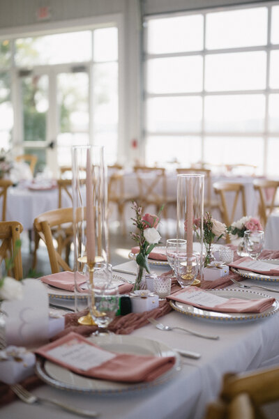 tablescape in the colors blush pink and white linens.