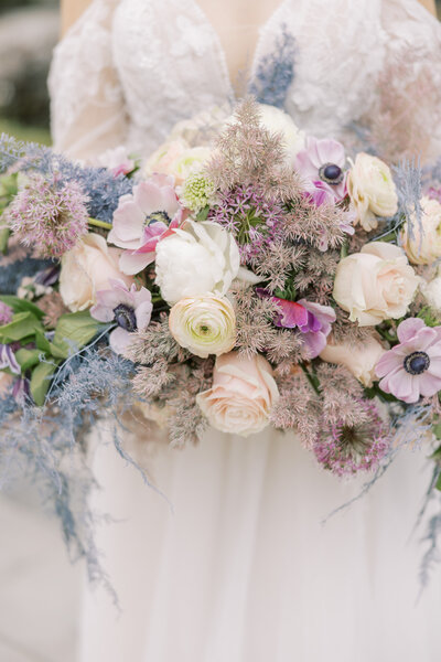 bouquet with purple, blue, pink and white flowers