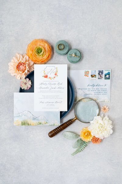 Vail, CO luxury destination wedding invitations flatlay.