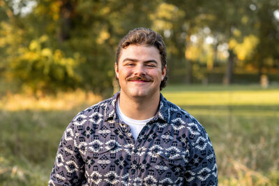 senior smiling at camera