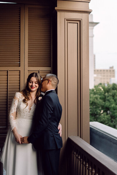 Bride and groom share an intimate moment during their Richmond, VA wedding portraits.