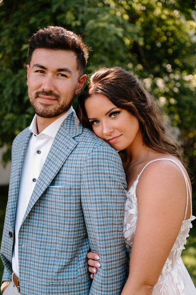 bride and groom embracing