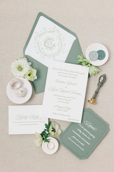 green wedding invitation detail photos