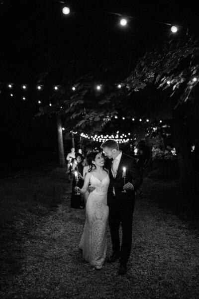 wedding photography showing shoes and veil draped in a tree