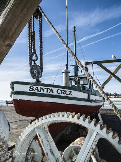 Restored Monterey style fishing boat “Marcella" on display at the Santa Cruz Wharf, Santa Cruz CA.