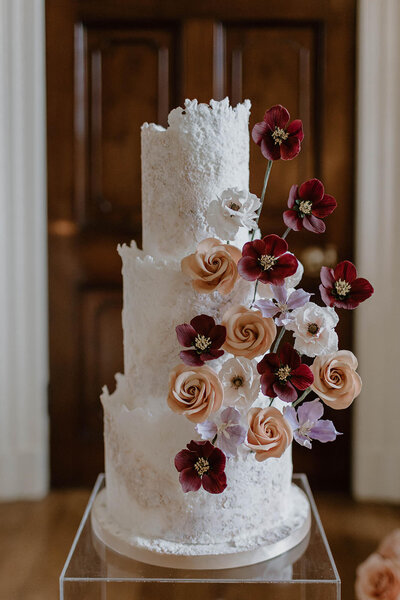 Elegant wedding cake with sugar flowers in Hampshire, England
