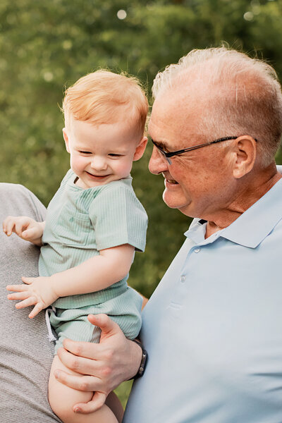 small child toddler smiling with mom