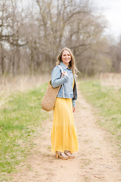 Amy walking on a dirt path