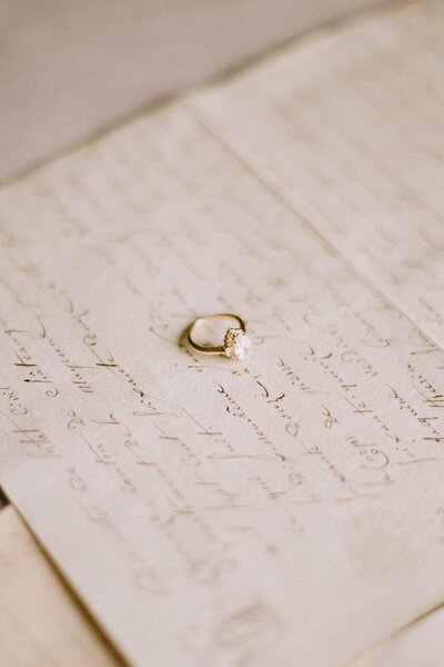 Diamond ring on a piece of paper