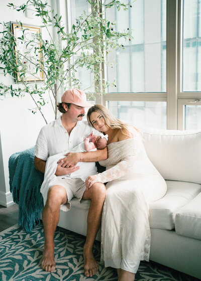 Mom holding baby by Austin Newborn Photographer