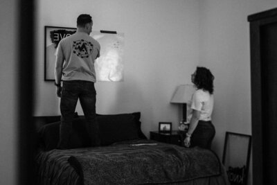 Cactus & Pine Photography owner and husband decorating new home for in-home portrait session. Captured by Rachel Richards Photo and Film