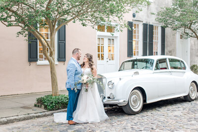 Newlyweds share moment in Downtown Historic Charleston by Karen Schanely.