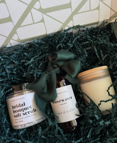 assorted floral salt body scrubs in various fun colors
