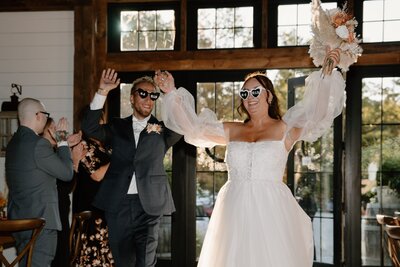 bride and groom wedding reception entrance
