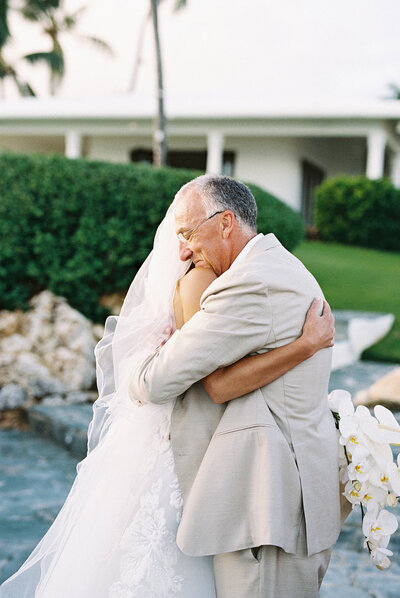 Emotional father-daughter embrace before the ceremony at Casa de Campo Resort, captured by Asia Pimentel Photography.