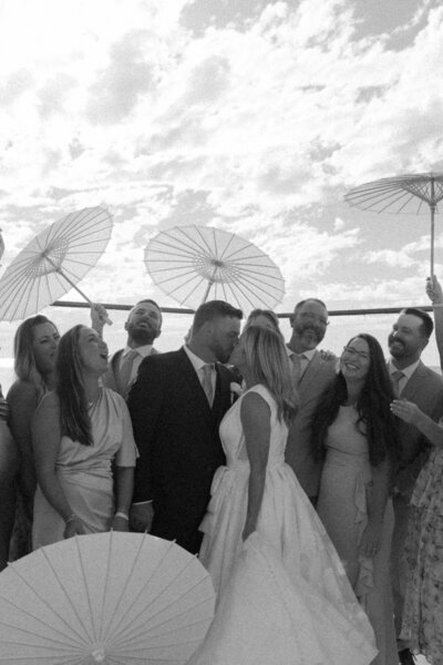 Bridal Party surround bride and groom in cabo san lucas wedding