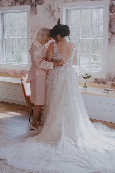 sweet moment between bride and mother