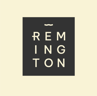Grey stacked Remington logo.