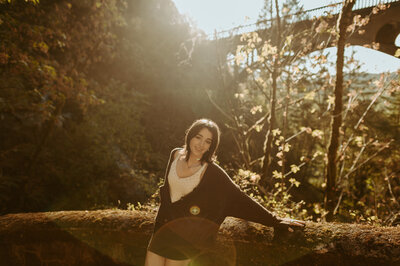 girl standing on bridge in columbia river gorge in oregon