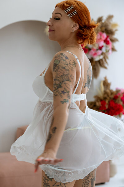 Future bride during boudoir photoshoot