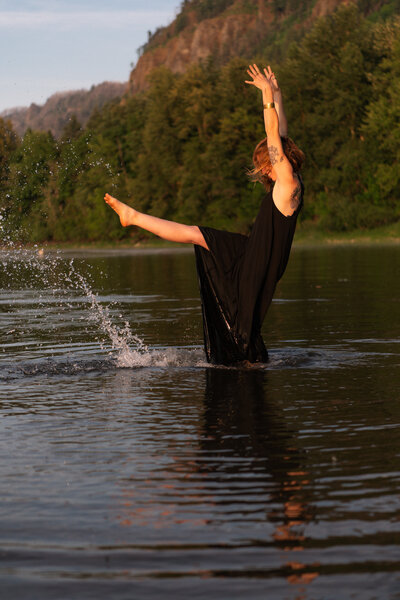 yoga teacher holding her hair back