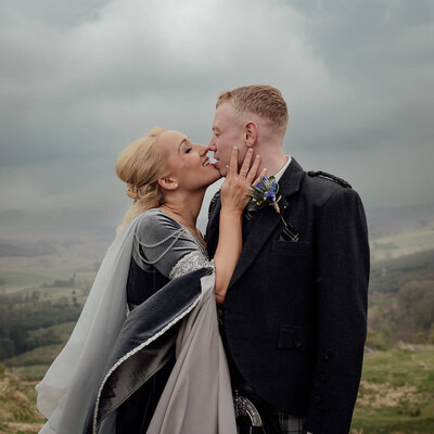 Scotland castle weddings elopement as couple kiss