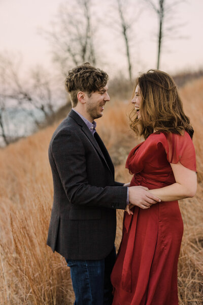 A joyful engagement photo at Fort Sheridan Forest Preserve in Illinois