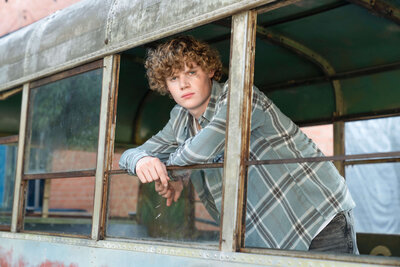 senior-guy-bus-window